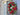 Oval Red and Green Christmas Wreath with Pinecones and Flickering Candle - TwoInspireYou