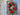 Oval Red and Green Christmas Wreath with Pinecones and Flickering Candle - TwoInspireYou