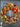 A decorative pumpkin wreath with a variety of autumn-colored flowers, including pumpkins, peonies, hydrangeas, and red berries, displayed on a door.
