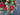 Christmas Wreath with Poinsettias, Pinecones & Gold Bells | - TwoInspireYou