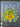A floral wreath with yellow sunflowers, blue and yellow wildflowers, and greenery in a rustic metal bucket attached to a dark door, adorned with a black and white striped bow.