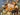 Autumn Cascading Foliage Wreath with Pumpkins and Fall Flowers - TwoInspireYou