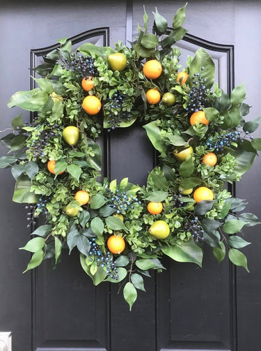 Fruit Wreath with Pears, Oranges, Blueberries and magnolia