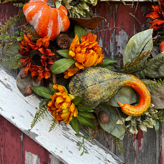 Fall wreath with gourds, pumpkins, peonies, and sunflowers