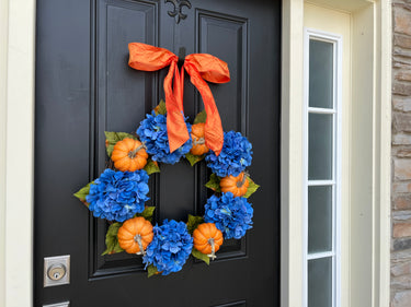 Vibrant Orange Pumpkin and Blue Hydrangea Wreath - TwoInspireYou