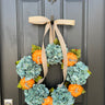 Modern Fall Hydrangea Wreath with Orange Pumpkins - TwoInspireYou