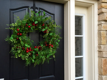 Christmas Wreath with Red Berries and Pinecones