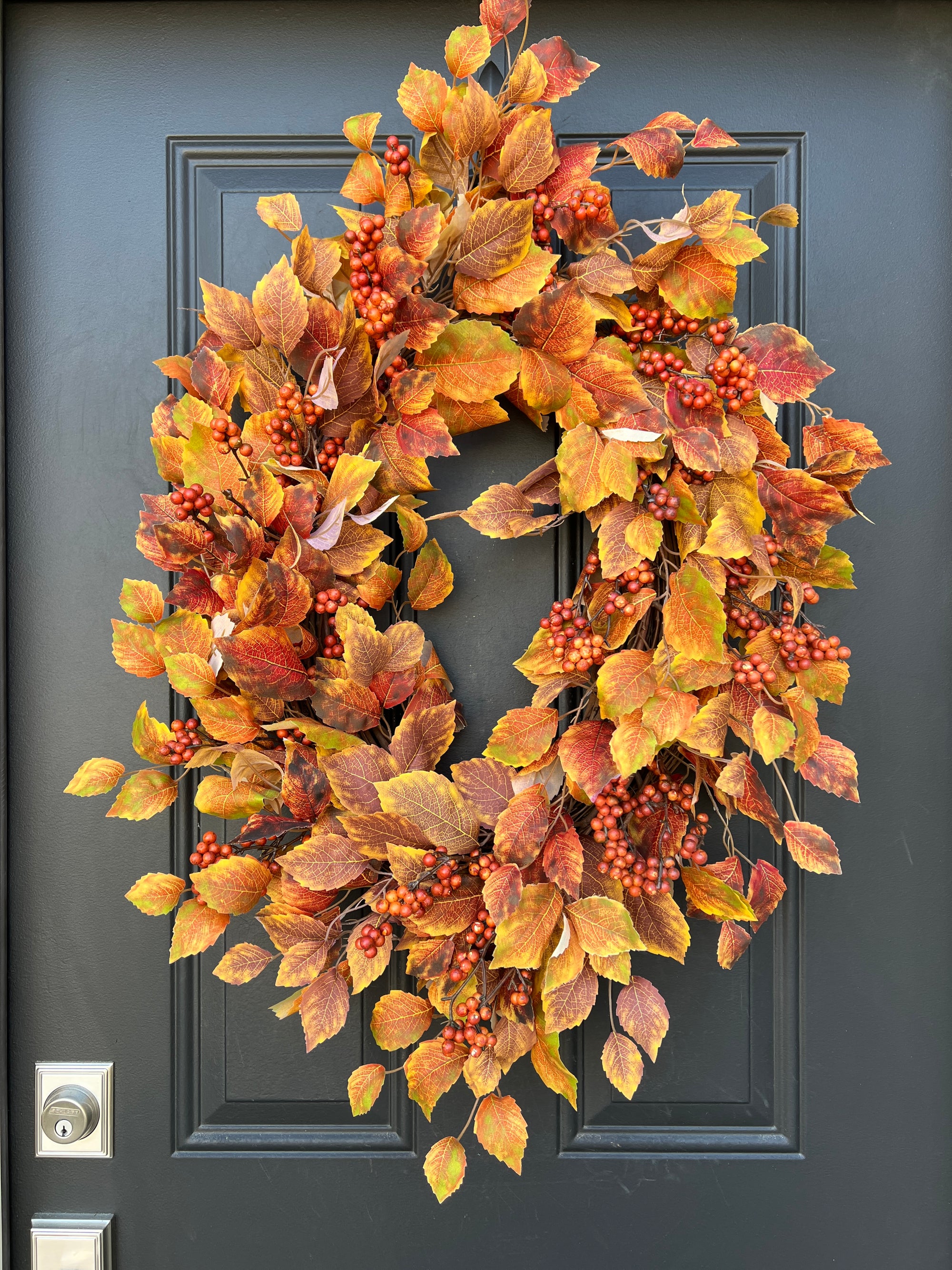 Oval Falling Leaves Wreath with Rust Berry Bunches