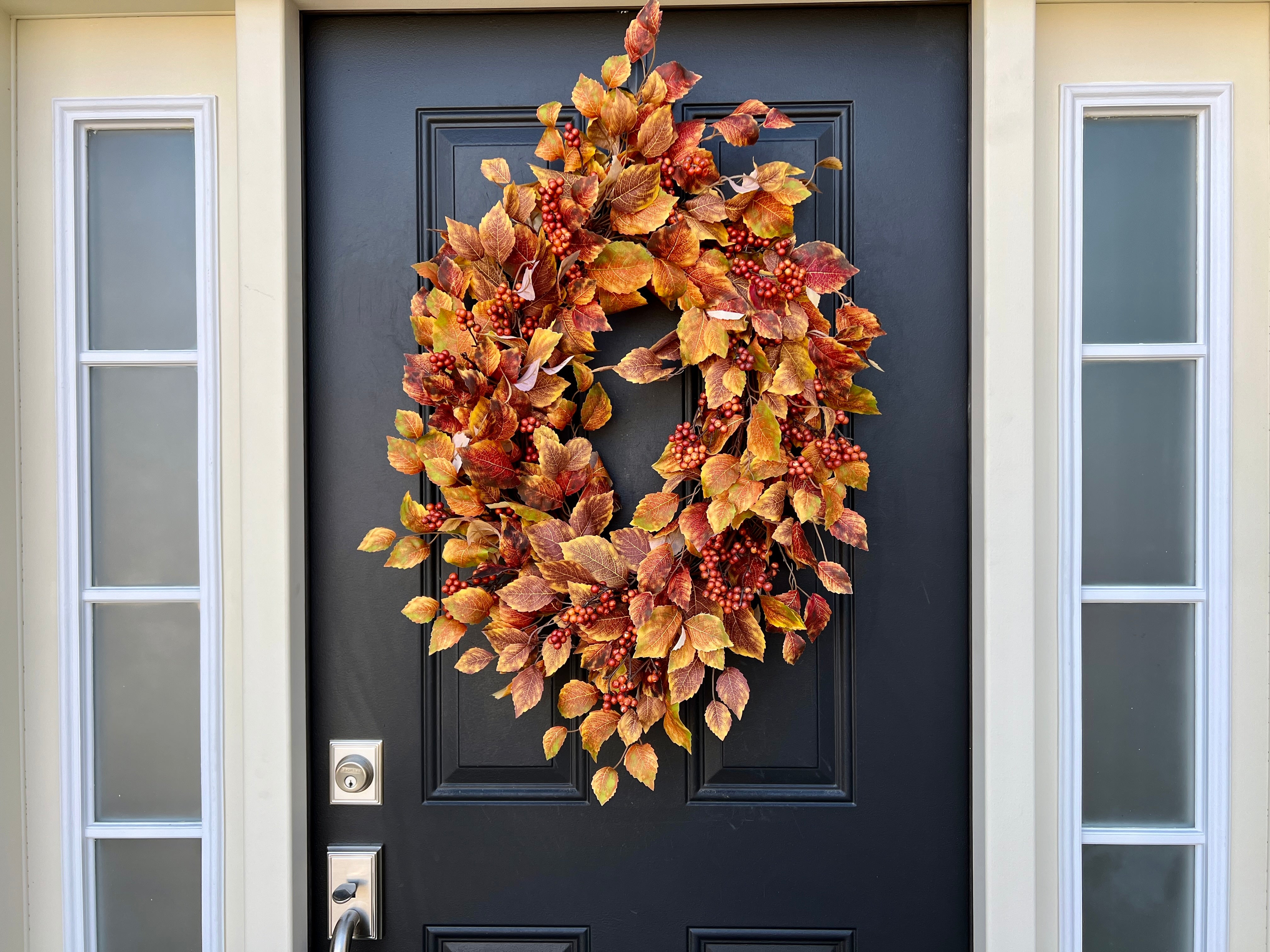 Oval Falling Leaves Wreath with Rust Berry Bunches