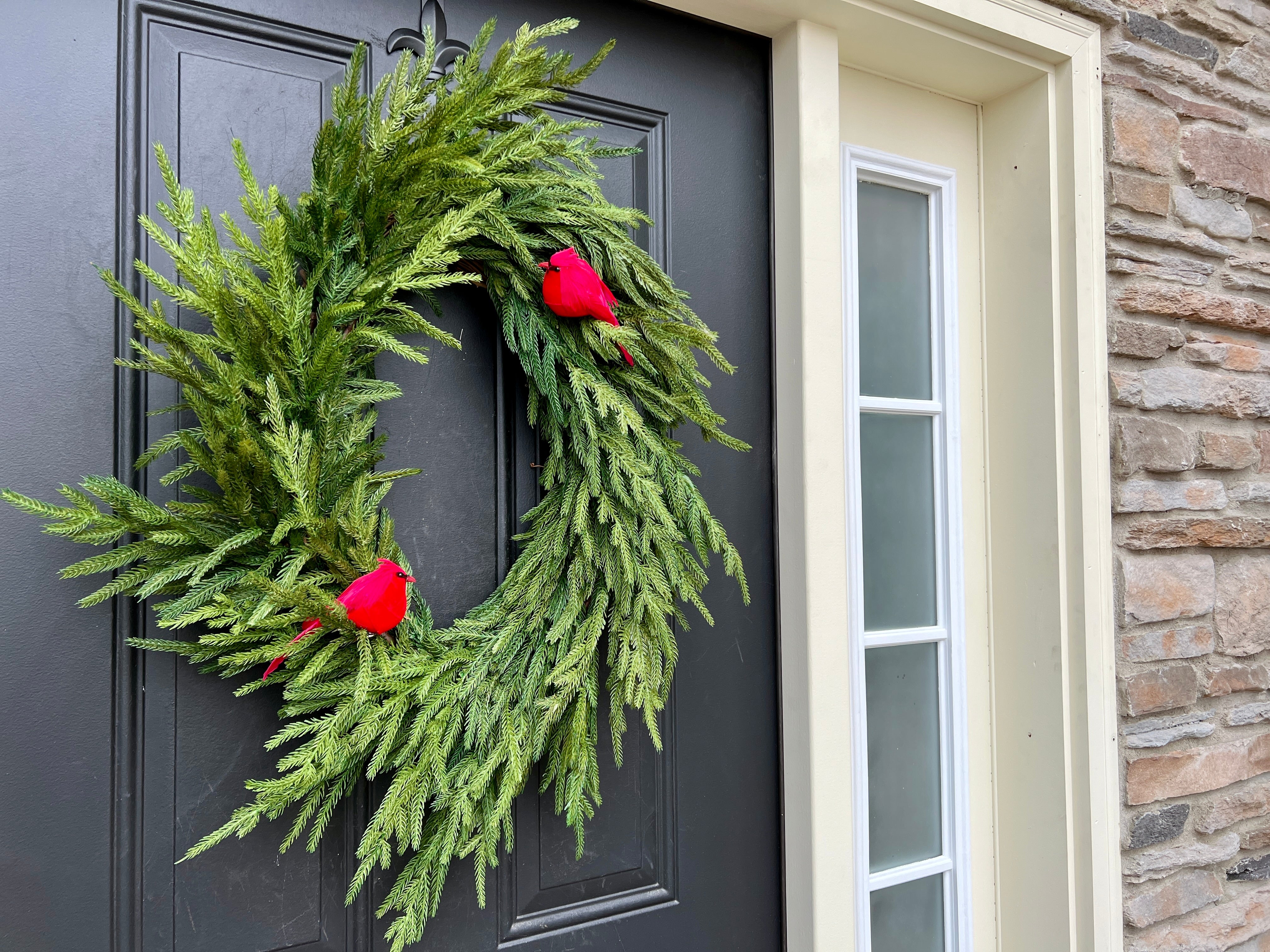 Natural Touch Norfolk Pine Wreath with Red Cardinals