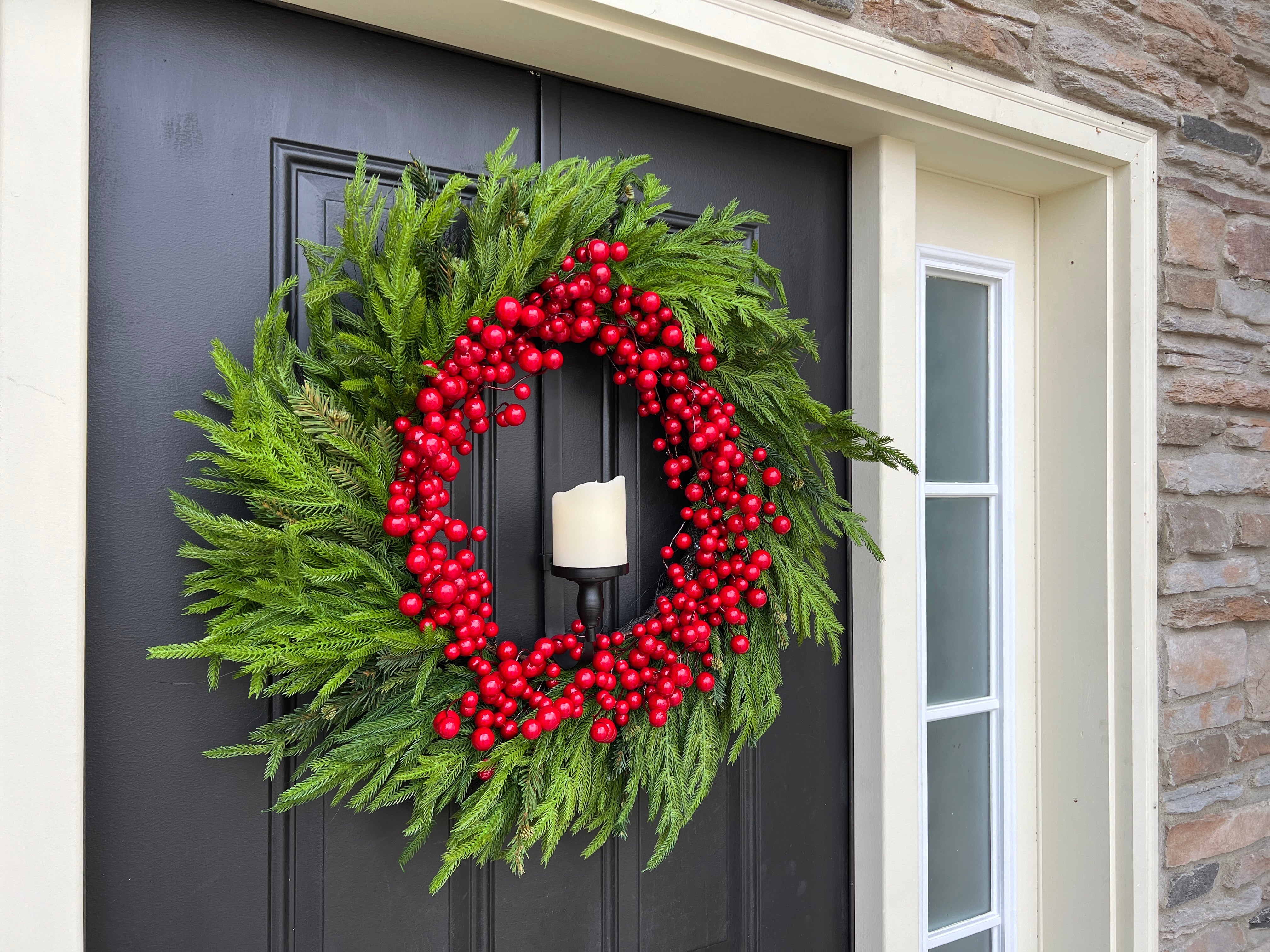 Pine and Berry Wreath with Flickering Flame Candle