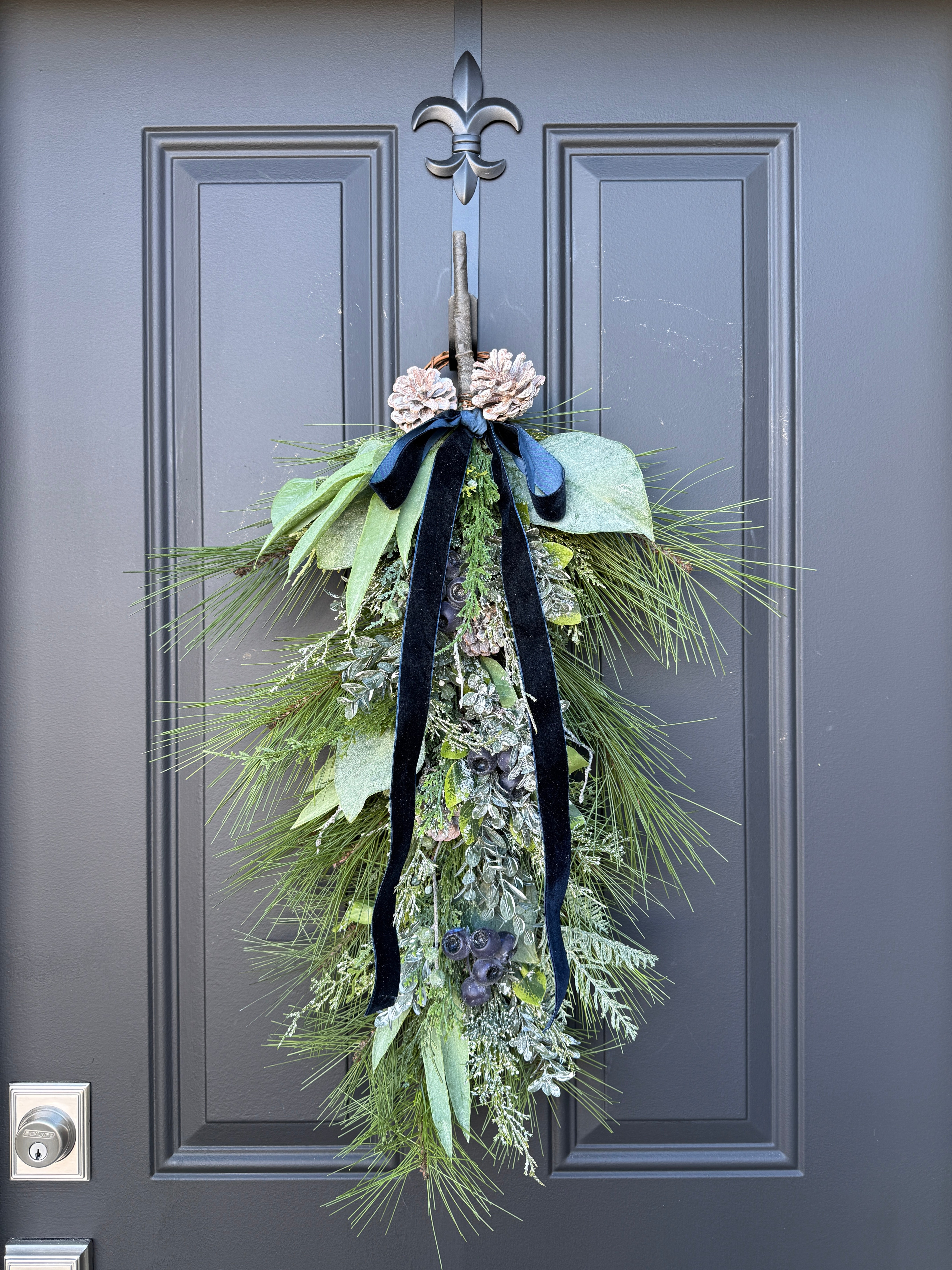 Winter Pine & Blueberry Swag with Black Velvet Ribbon – Elegant Door Accent