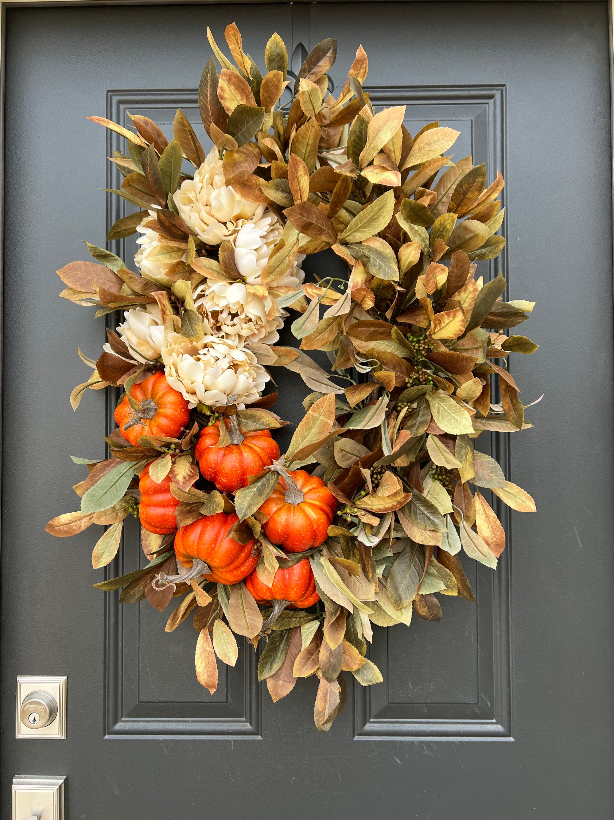 Oval Wreath with Fall Foliage and Orange Pumpkins