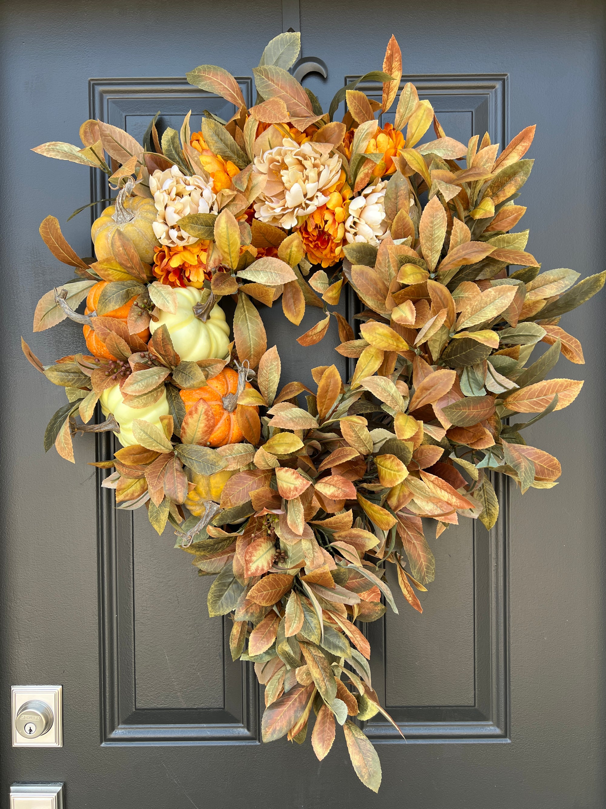 Seasonal Cascading Wreath with Orange, Cream, and Green Pumpkins