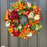 Warm & Inviting Autumn Wreath with Fall Flowers and Pods - TwoInspireYou