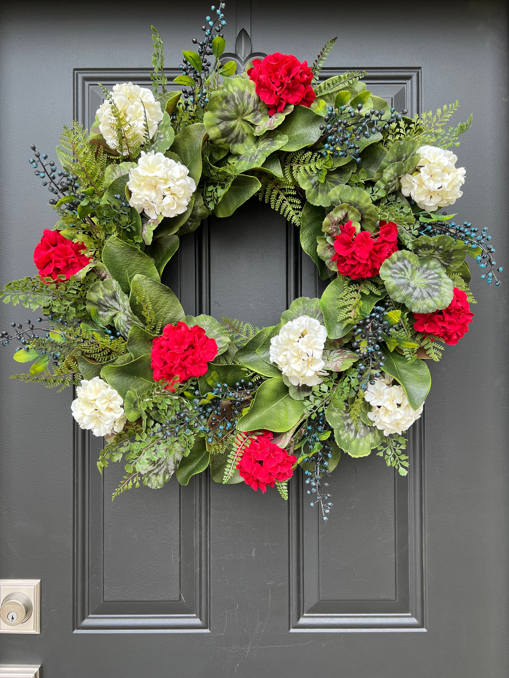 Red and white geranium with blueberries wreath