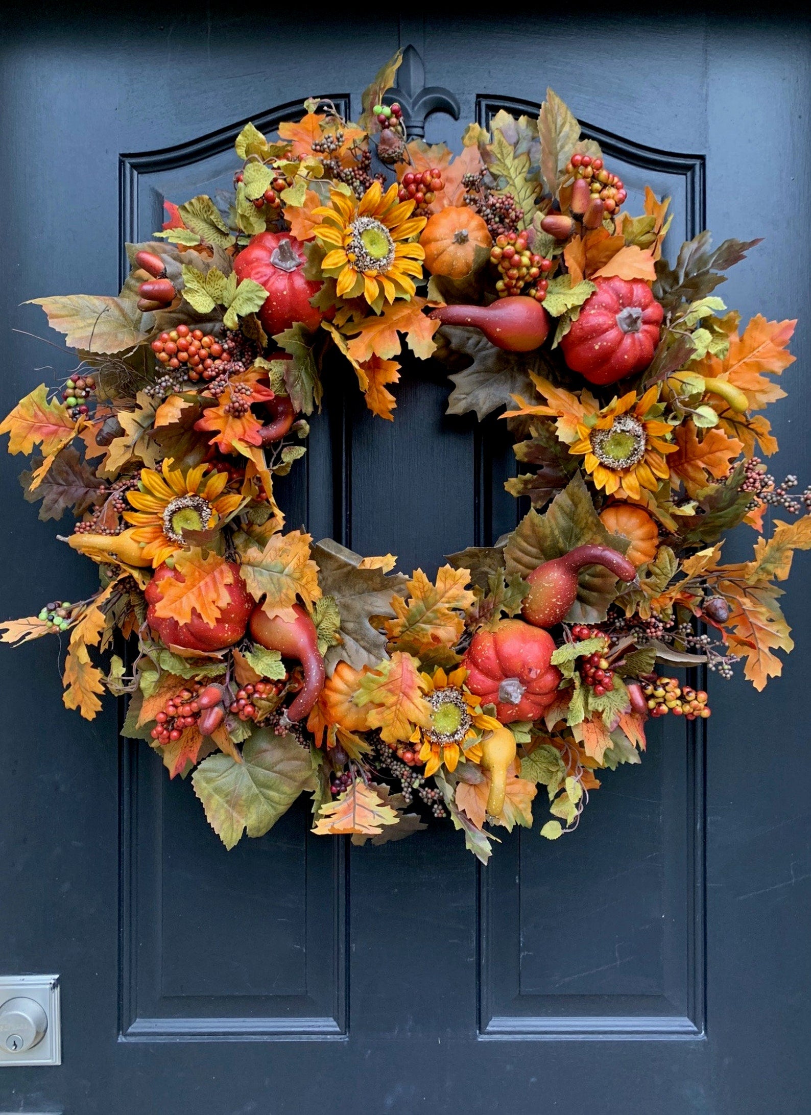 Realistic Fall Wreath with leaves, acorns, sunflowers, pumpkins and gourds