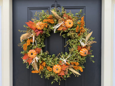 Harvest Sun Wreath with Fall Eucalyptus and Orange Pumpkins - TwoInspireYou