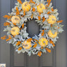 Farmhouse Style Fall Wreath with yellow pumpkins