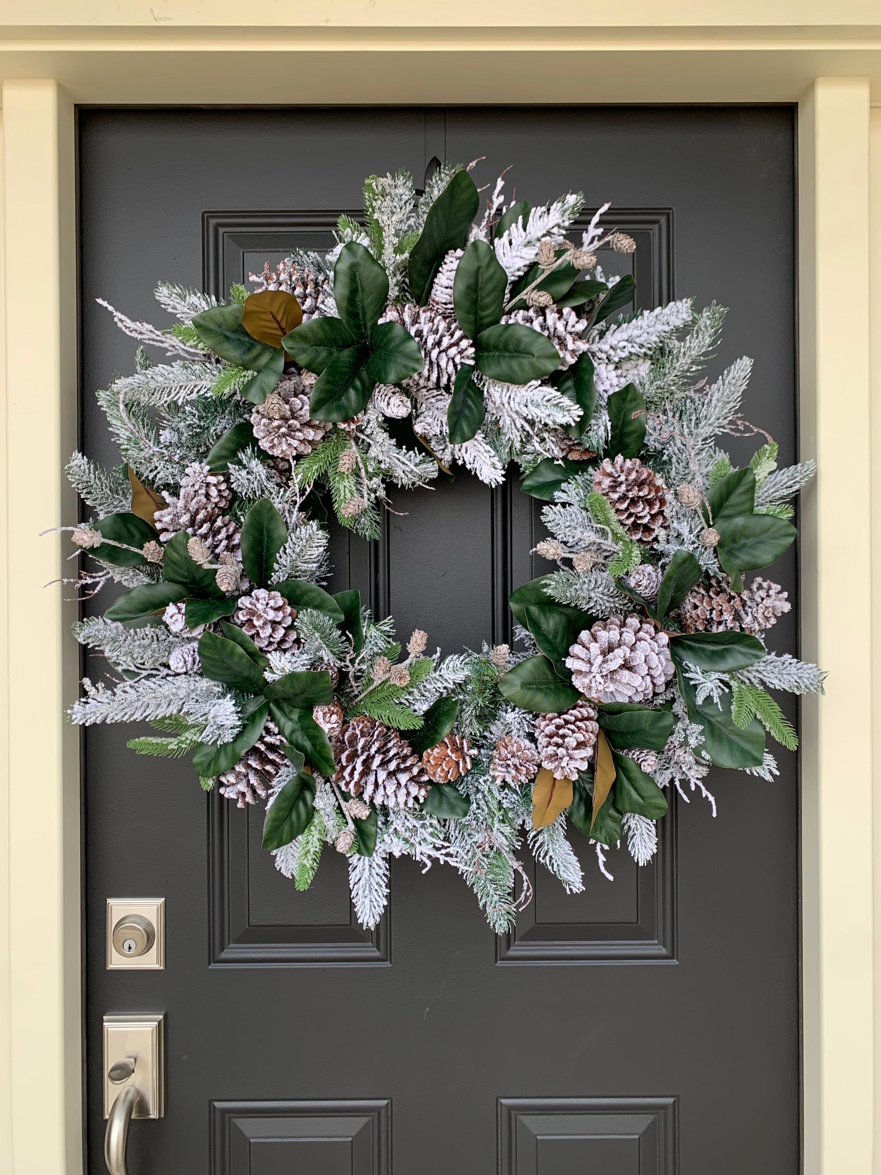 Snowy Winter Wreath with pinecones