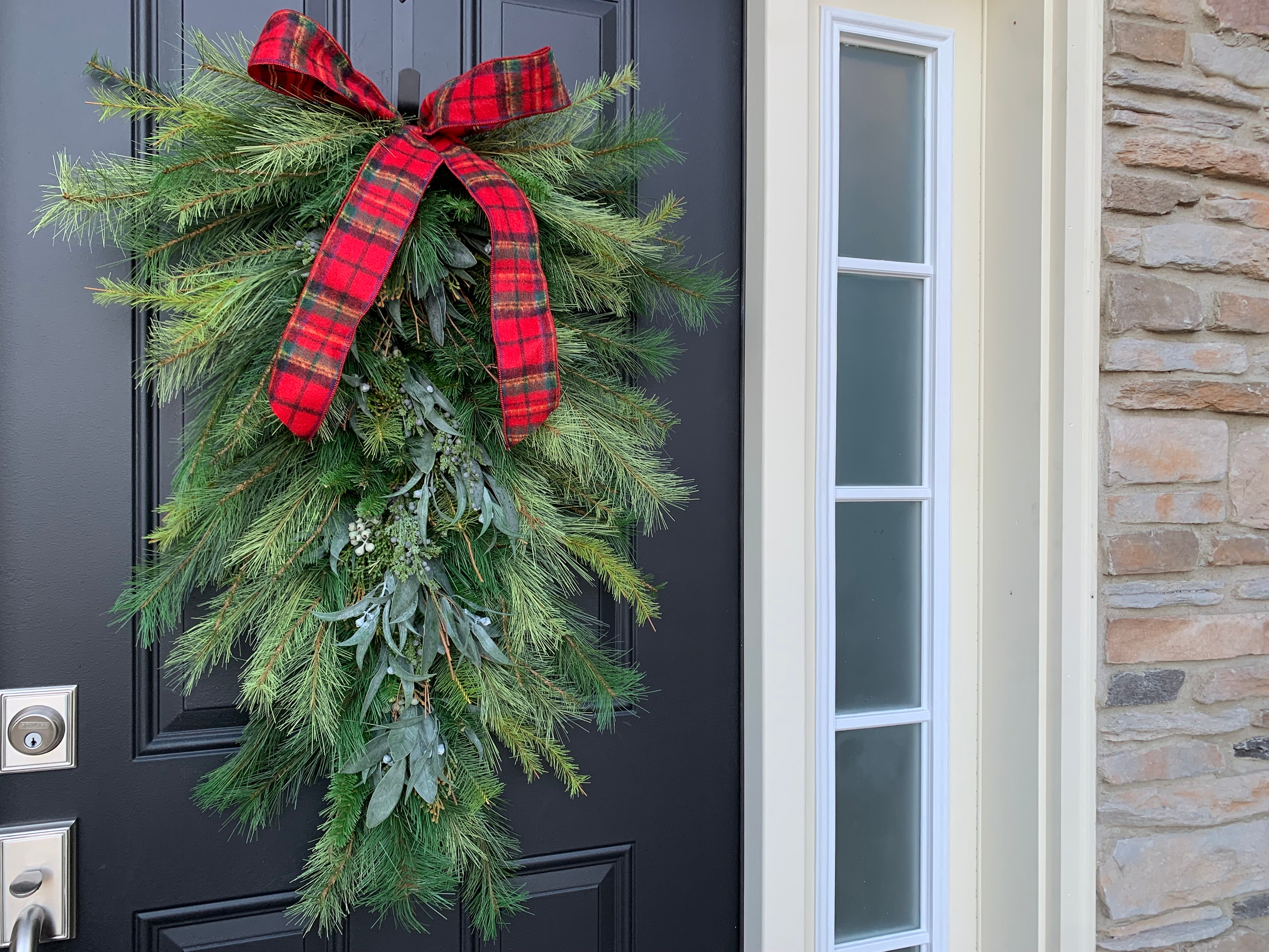 Evergreen Pine Teardrop Door Wreath with Plaid Ribbon