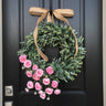 Eucalyptus and ranunculus wreath, front view, black front door, spring and summer wreath, pink flowers