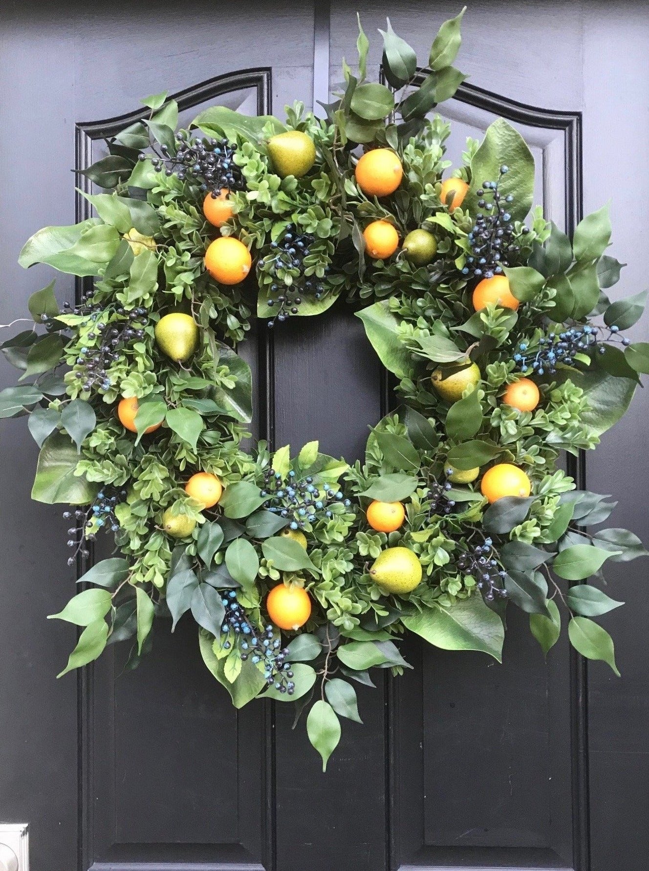Fruit Wreath with Pears, Oranges, Blueberries and magnolia 