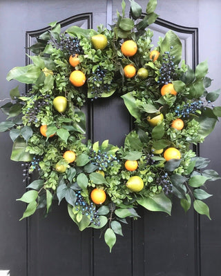 Fruit Wreath with Pears, Oranges, Blueberries and magnolia 