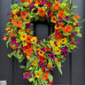 Colorful summer daisy wreath